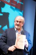 Germany, Berlin, 14.09.2013, Salman Rushdie at the 13th International Literature Festival in Berlin, Rushdie with a copy of his autobiography Joseph Anton