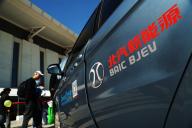 --FILE--An E150EV electric car of BAIC BJEV of BAIC Group is seen in Tianjin, China, 6 October 2014. China