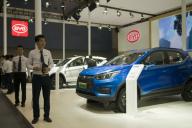 --FILE--People visit the stand of BYD during the 16th China (Guangzhou) International Automobile Exhibition, also known as Auto Guangzhou 2018, in Guangzhou city, south China