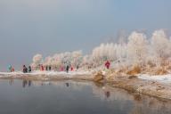 Tourists admire rime on trees in Jilin City, northeast China