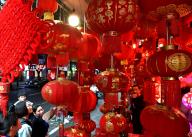 **CHINESE MAINLAND, HONG KONG, MACAU AND TAIWAN OUT** People shop Spring Festival decorations at a market in Fuzhou City, southeast China