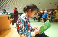 Children read books at Beijing Library, Beijing, China, 30 January, 2024