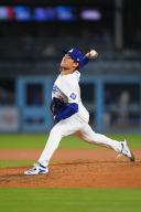 LOS ANGELES, CA - APRIL 19: Los Angeles Dodgers pitcher Yoshinobu Yamamoto (18) throws a pitch during the MLB game between the New York Mets and the Los Angeles Dodgers on April 19, 2024 at Dodger Stadium in Los Angeles, CA. (Photo by Brian Rothmuller\/Icon Sportswire