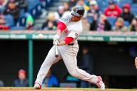 CLEVELAND, OH - APRIL 24: Boston Red Sox designated hitter Rafael Devers (11) hits a home run during the fifth inning of the Major League Baseball game between the Boston Red Sox and Cleveland Guardians on April 24, 2024, at Progressive Field in Cleveland, OH. (Photo by Frank Jansky\/Icon Sportswire