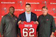 TAMPA, FL - MAY 12: Tampa Bay Buccaneers 2024 first round pick offensive lineman Graham Barton (62) is flanked by Head Coach Todd Bowles and General Manager Jason Licht during the Tampa Bay Buccaneers First Round Pick Press Conference on April 26, 2024 at the AdventHealth Training Center at One Buccaneer Place in Tampa, Florida. (Photo by Cliff Welch\/Icon Sportswire