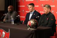 TAMPA, FL - MAY 12: Tampa Bay Buccaneers 2024 first round pick offensive lineman Graham Barton (62) is flanked by Head Coach Todd Bowles and General Manager Jason Licht during the Tampa Bay Buccaneers First Round Pick Press Conference on April 26, 2024 at the AdventHealth Training Center at One Buccaneer Place in Tampa, Florida. (Photo by Cliff Welch\/Icon Sportswire