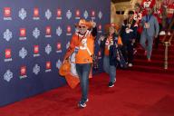 DETROIT, MI - APRIL 25: Denver Broncos Super Fans arrive at the NFL Draft Red Carpet event on April 25, 2024 at Fox Theatre in Detroit, MI. (Photo by John Smolek\/Icon Sportswire