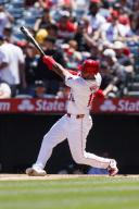 ANAHEIM, CA - APRIL 28: Los Angeles Angels outfielder Aaron Hicks (12) swings during an MLB baseball game against the Minnesota Twins on April 28, 2024 at Angel Stadium in Anaheim, CA. (Photo by Ric Tapia\/Icon Sportswire