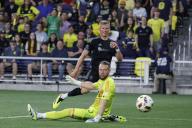 NASHVILLE, TN - MAY 04: Nashville SC forward Sam Surridge (9) watches his shot go in the goal past CF MontrÅ½al goalkeeper Jonathan Sirois (40) during a match between Nashville SC and CF MontrÅ½al, May 4, 2024 at GEODIS Park in Nashville, Tennessee. (Photo by Matthew Maxey\/Icon Sportswire