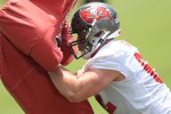 TAMPA, FL - MAY 11: Tampa Bay Buccaneers Center Graham Barton (62) goes thru a drill during the Tampa Bay Buccaneers Rookie Minicamp on May 11, 2023 at the AdventHealth Training Center at One Buccaneer Place in Tampa, Florida. (Photo by Cliff Welch\/Icon Sportswire