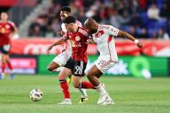 HARRISON, NJ - MAY 11: Lewis Morgan #9 of New York Red Bulls controls the ball the ball during the first half of the game against the New England Revolution on May 11, 2024 at Red Bull Arena in Harrison, New Jersey. (Photo by Rich Graessle\/Icon Sportswire