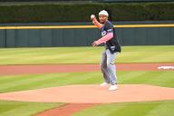 DETROIT, MI - MAY 11: Detroit Lions wide receiver throws out the first pitch before the game between Houston Astros and Detroit Tigers on May 11, 2024 at Comerica Park in Detroit, MI. (Photo by Allan Dranberg/Icon Sportswire