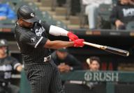CHICAGO, IL - MAY 14: Eloy JimÃ©nez #74 of the Chicago White Sox hits a home run during the second inning during game one of a doubleheader against the Washington Nationals on May 14,2024 at Guaranteed Rate Field in Chicago,Illinois. (Photo by Melissa Tamez/Icon Sportswire