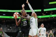 SEATTLE, WA - MAY 14: Seattle Storm guard Jordan Horston (23) goes up for a shot against Minnesota Lynx forward Napheesa Collier (24) during a WNBA game between the Seattle Storm and Minnesota Lynx on May 14, 2024 at Climate Pledge Arena in Seattle, WA. (Photo by Jeff Halstead/Icon Sportswire