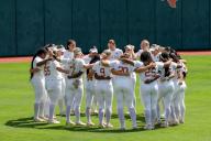 AUSTIN, TX - MAY 18: Texas players huddle up in the outfield before the NCAA Division I Regional game between Texas Longhorns and Northwestern Wildcats on May 18, 2024, at Red & Charline McCombs Field in Austin, TX. (Photo by David Buono/Icon Sportswire