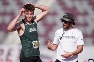Heath Baldwin of Michigan State (left) talks with jumps coach Richard Fisher during the decathlon high jump at the 64th Mt. San Antonio College Relays at Hilmer Lodge Stadium, Wednesday, April 17, 2024, in Walnut, Calif