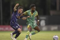 St. Petersburg, FL: El Paso Locomotive FC defender Lucas Stauffer (4) tries to steal the ball from Tampa Bay Rowdies midfielder Pacifique Niyongabire (27) during a USL soccer game, Saturday, April 20, 2024, at Al Lang Stadium. The Rowdies and Locomotive played to a 1-1 draw. (Kim Hukari/Image of Sport