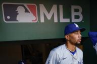 WASHINGTON, DC - APRIL 24: Mookie Betts #50 of the Los Angeles Dodgers walks in the dugout prior to a game against the Washington Nationals at Nationals Park on April 24, 2024 in Washington, DC. (Photo by Brandon Sloter\/Image Of Sport