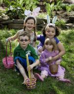 Kids pose for easter egg hunt photo