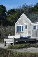 Rustic coastal boat house on Cape Cod