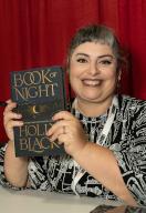 Donna Barba Higuera signs her book "Book of Night" at the Library of Congress National Book Festival on Saturday, September 3, 2022 at the Walter E. Washington Convention Center in Washington D.C. (Photo by Jeff Malet