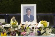 This photo taken September 27, 2022 shows flower offering stands set up at the headquarters of the Liberal Democratic Party in Tokyo, on the day of state funeral for former Prime Minister Shinzo Abe. JIJI PRESS PHOTO / MORIO TAGA