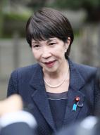 Japanese economic security minister Sanae Takaichi speaks to the media after visiting Yasukuni Shrine in Tokyo, Tuesday, April 23, 2024. Takaichi visited the war-related Shinto shrine during its three-day spring festival from Sunday. (Jiji Press\/Kenya Sumiyoshi