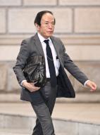 Bank of Japan Gov. Kazuo Ueda arrives at BOJ headquarters to attend a Policy Board meeting, in Tokyo, Friday, April 26, 2024. The central bank decided to keep its monetary policy unchanged at the two-day Policy Board meeting that ended Friday after a major shift in March. (Jiji Press\/POOL
