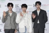 Three members from boy group ZEROBASEONE pose for photographers on a red carpet at Korean entertainment festival KCON Japan held at Makuhari Messe in Chiba city, near Tokyo, on May 12, 2024. JIJI PRESS PHOTO / MORIO TAGA