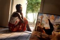 KRT US NEWS STORY SLUGGED: HAITIANS-DETAINEES KRT PHOTOGRAPH BY CANDACE BARBOT/MIAMI HERALD (FORT LAUDERDALE OUT) (December 18) Haitian immigrant Chimene Noel relies on her faith and natural tenacity to carry her through as she struggles to help her...