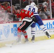 Chicago Blackhawks right wing John Hayden (40) and Toronto Maple Leafs defenseman Morgan Rielly (44) during the first period of their game at the United Center on Sunday, Oct. 7, 2018 in Chicago. (Nuccio DiNuzzo/Chicago Tribune/TNS)