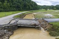A bridge across Grapevine Creek at Chavies School Road in Perry County, Kentucky, is heavily damaged Tuesday, Aug. 2, 2022, following catastrophic flooding last week. (Ryan C. Hermens/Lexington Herald-Leader/TNS