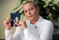 Virginia Roberts Giuffre holds a photo of herself as a teen, when she says she was abused by Jeffrey Epstein, Ghislaine Maxwell and Prince Andrew, among others. (Emily Michot/Miami Herald/TNS