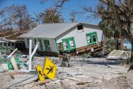 A damaged home caused by Hurricane Ian seen along Fort Myers Beach on Monday, Oct. 3, 2022. (Al Diaz/Miami Herald/TNS