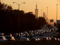 The sun rises over Chicago and the Eisenhower expressway during early morning rush hour, Tuesday, Oct. 3, 2023. (Antonio Perez/ Chicago Tribune/TNS