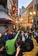 Japan supporters celebrate in Osaka\'s Dotonbori area in western Japan on Dec. 2, 2022, following Japan\'s come-from-behind win over Spain in a World Cup Group E football match in Doha, Qatar. Japan beat Spain 2-1 to advance to the round of 16. (Kyodo) ==Kyodo