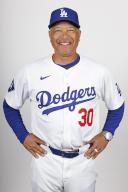 Los Angeles Dodgers manager Dave Roberts poses for a photo during the photo day at spring training on Feb. 21, 2024, in Glendale, Arizona. (Kyodo) ==Kyodo