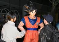 Tourists in Tokyo look at a figure of a character from the Japanese manga "Dragon Ball" created by Akira Toriyama on March 8, 2024, after the news that the creator died of an acute subdural hematoma on March 1, aged 68, made the headlines around the world. (Kyodo) ==Kyodo