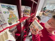 A child picks up a Chinese version of the Japanese manga "Dragon Ball" in a library in Beijing on March 8, 2024. The manga series is the best known work of Akira Toriyama, a monumental figure in the Japanese manga and anime world, who died of an acute subdural hematoma on March 1, aged 68. (Kyodo) ==Kyodo