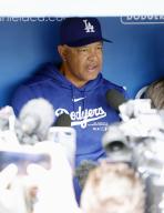 Los Angeles Dodgers manager Dave Roberts speaks to reporters before a spring training game against the Los Angeles Angels in Los Angeles on March 24, 2024. (Kyodo) ==Kyodo