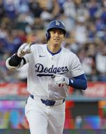 Los Angeles Dodgers designated hitter Shohei Ohtani rounds the bases after hitting a two-run home run in the first inning of a baseball game against the Miami Marlins at Dodger Stadium in Los Angeles on May 6, 2024. (Kyodo) ==Kyodo