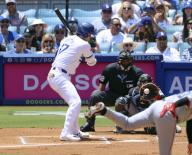 Shohei Ohtani of the Los Angeles Dodgers is called out on strikes in the first inning of a baseball game against the Miami Marlins on May 8, 2024, at Dodger Stadium in Los Angeles. (Kyodo) ==Kyodo