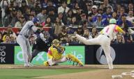Shohei Ohtani of the Los Angeles Dodgers hits a double off compatriot Yuki Matsui in the eighth inning of a baseball game against the San Diego Padres on May 10, 2024, at Petco Park in San Diego, California. (Kyodo) ==Kyodo