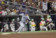Shohei Ohtani of the Los Angeles Dodgers runs the bases after hitting a double in the eighth inning of a baseball game against the San Diego Padres on May 10, 2024, at Petco Park in San Diego, California. (Kyodo) ==Kyodo