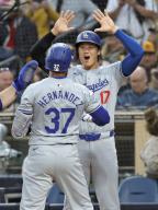 Teoscar Hernandez (37) of the Los Angeles Dodgers is greeted by Shohei Ohtani after hitting a grand slam in the sixth inning of a baseball game against the San Diego Padres on May 11, 2024, at Petco Park in San Diego, California. (Kyodo) ==Kyodo