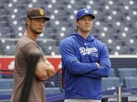 Shohei Ohtani (R) of the Los Angeles Dodgers and Yu Darvish of the San Diego Padres talk ahead of their teams