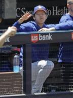 Shohei Ohtani of the Los Angeles Dodgers watches a baseball game against the San Diego Padres from the dugout on May 12, 2024, at Petco Park in San Diego, California. Ohtani was not in the starting lineup due to back tightness. (Kyodo) ==Kyodo