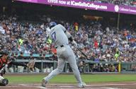 Los Angeles Dodgers designated hitter Shohei Ohtani hits a single in the first inning of a baseball game against the San Francisco Giants at Oracle Park in San Francisco on May 13, 2024. (Kyodo) ==Kyodo