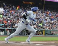 Los Angeles Dodgers designated hitter Shohei Ohtani hits a single in the first inning of a baseball game against the San Francisco Giants at Oracle Park in San Francisco on May 13, 2024. (Kyodo) ==Kyodo