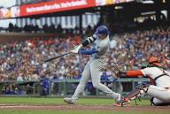 Los Angeles Dodgers designated hitter Shohei Ohtani hits a solo home run in the fourth inning of a baseball game against the San Francisco Giants at Oracle Park in San Francisco on May 14, 2024. (Kyodo) ==Kyodo